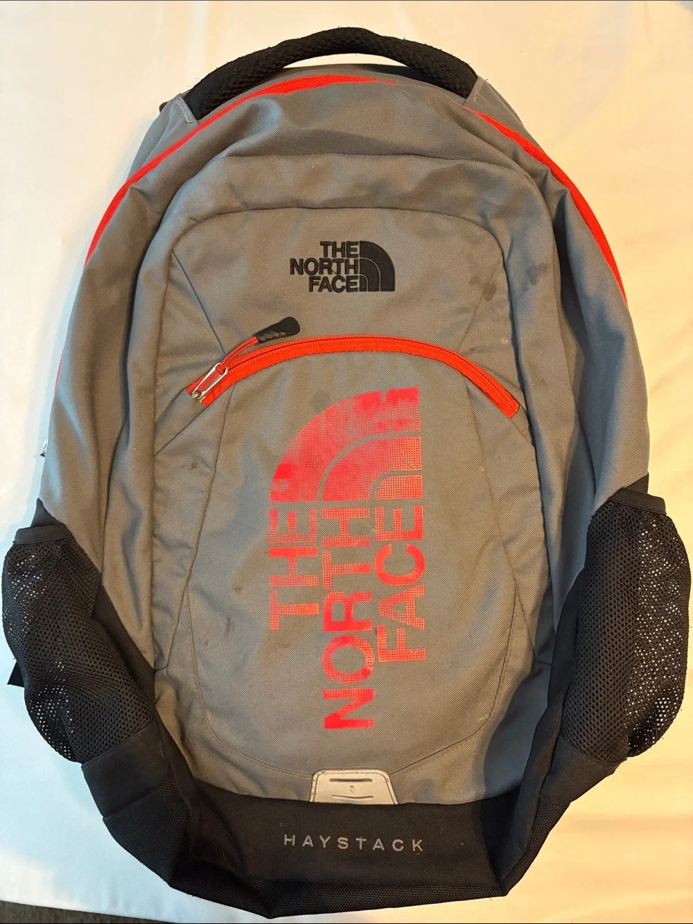 The North Face Gray Backpack with Red Accents